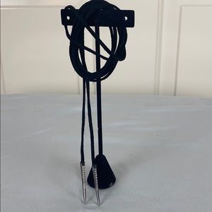 Kendra Scott black leather like choker spike ends.